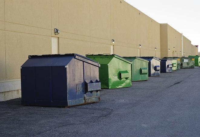 construction waste bins waiting to be picked up by a waste management company in Crozet, VA