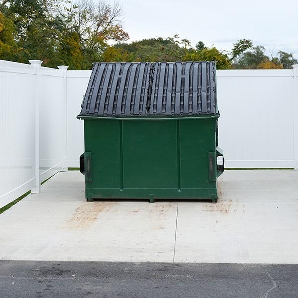 all of our commercial dumpsters come with covers to keep debris contained and prevent weather damage